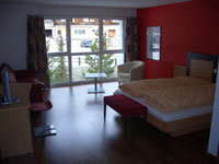 large double room with sofa bed - north - wiew to the Belalp